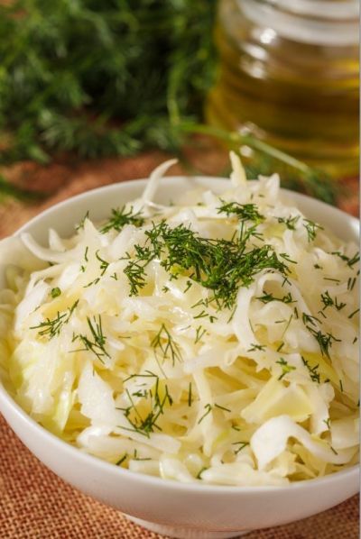 Șnițel elvețian, cartofi felii, salata varza